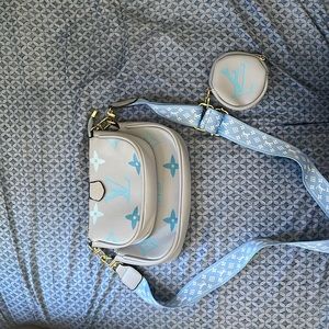 A Luis Vuitton women’s shoulder bag.